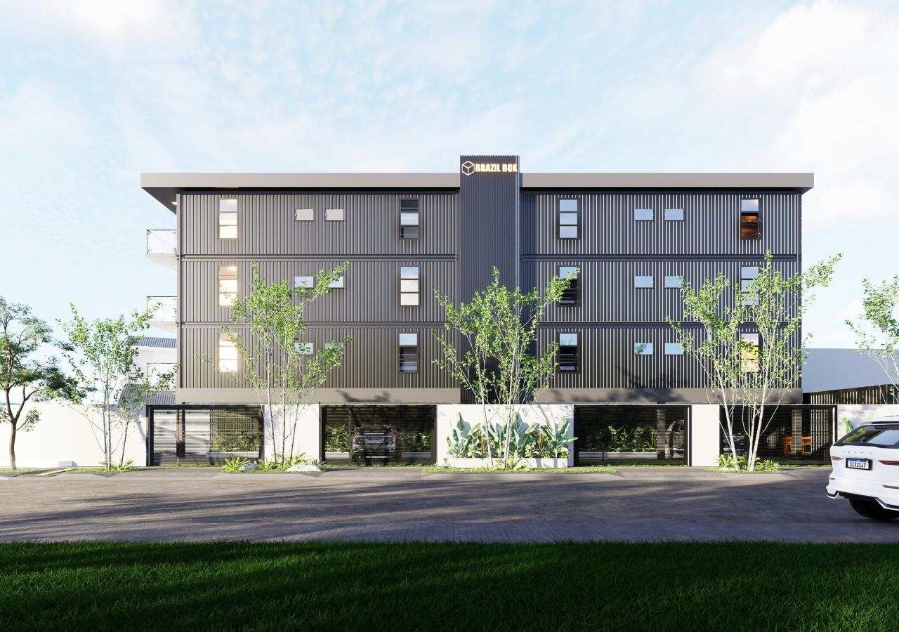 Modern apartment building with clean lines and landscaping.