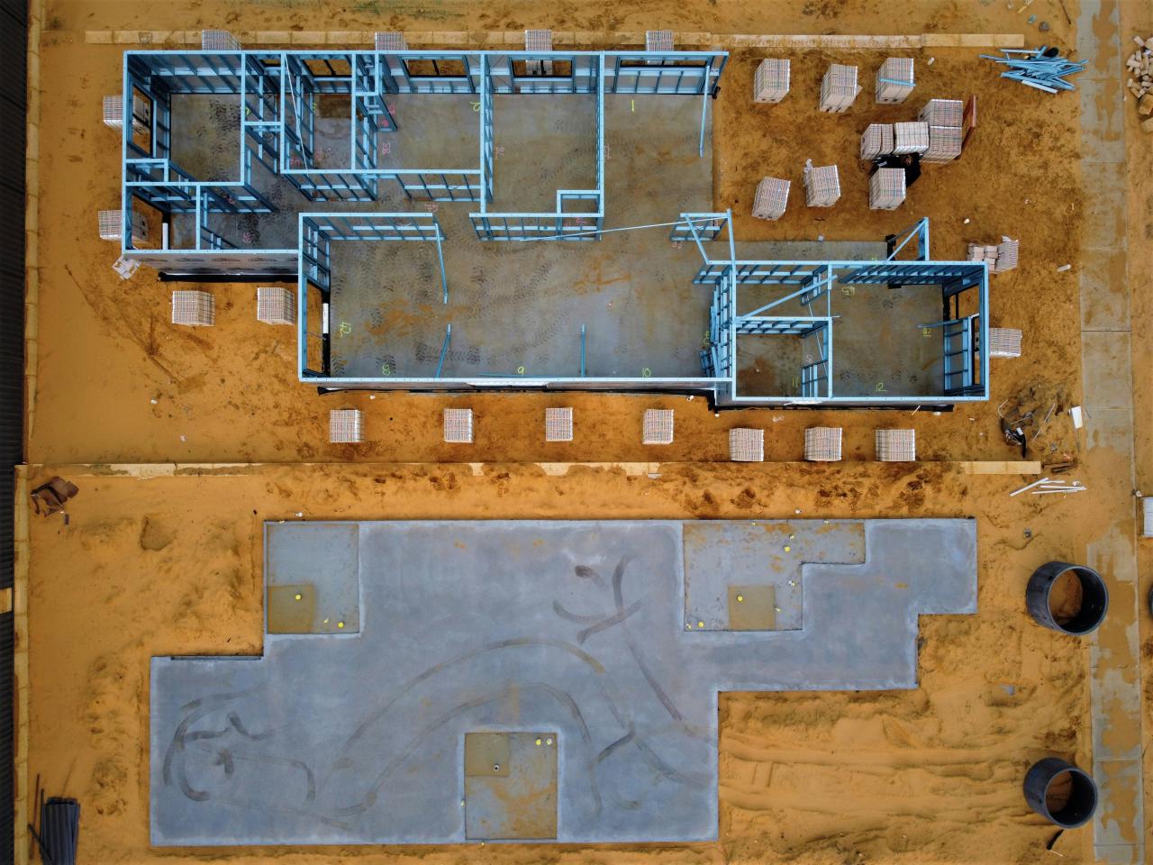 an aerial view of a construction site with concrete blocks